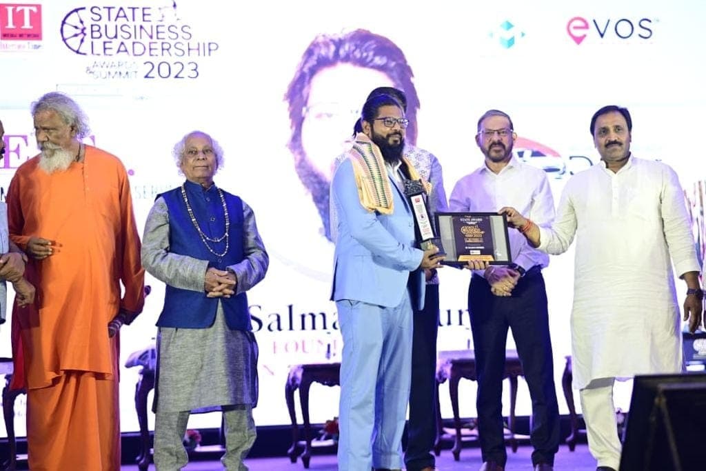 Founder receiving an award at the State Business Leadership Awards and Summit 2023